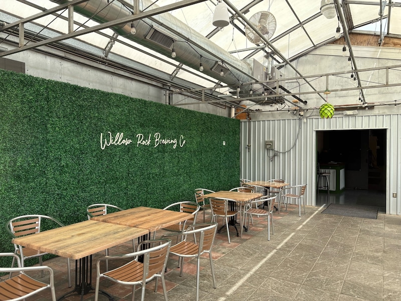 Willow Rock Cicero taproom patio with string lights at dusk