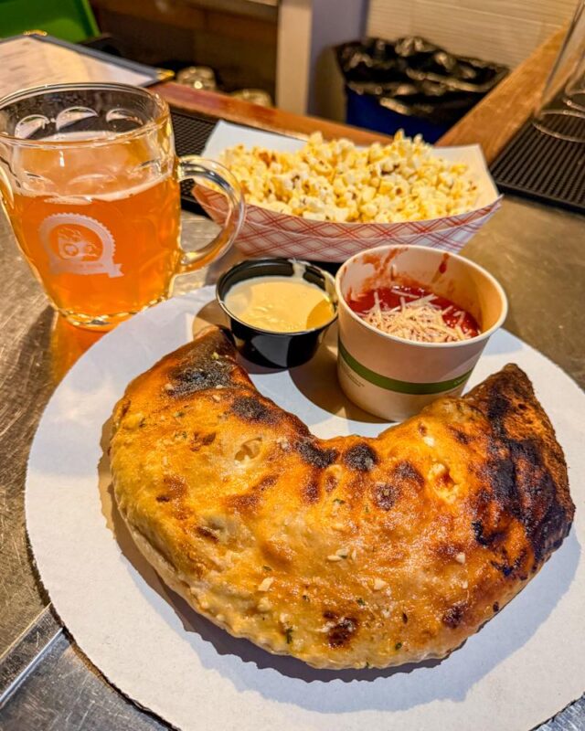 A calzone, pint of beer, and some popcorn make for the perfect Thirsty Thursday at Willow Rock 🍻